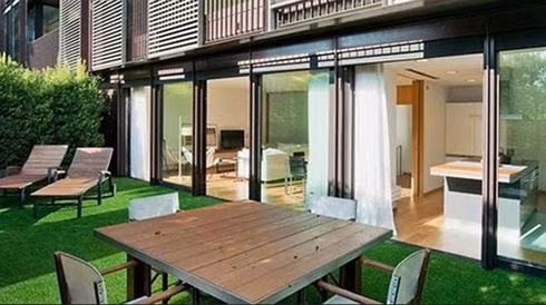 Phòng khách như khu vườn nhỏ, gần gũi với thiên nhiên.