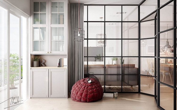 Gia chủ đặt ghế sofa trước vách kính cũng là một cách giúp phòng ngủ được kín đáo hơn mà không ảnh hưởng đến tầm nhìn. Phía bên kia của tường kính cũng là ghế ngồi đáng yêu màu mận chín.