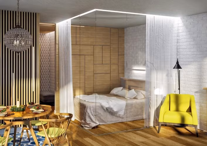 Sử dụng kính để làm tường ngăn luôn là giải pháp hiệu quả, kính dễ lắp ráp lại không cản sáng vẫn giúp căn phòng rộng rãi, để tăng cường sự riêng tư bạn có thể thêm rèm che.