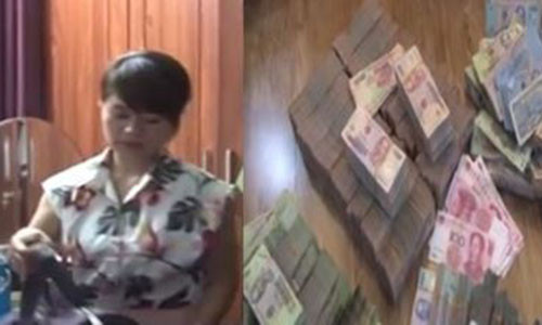 Đối tượng Chung cùng số tiền hàng tỷ đồng bị thu giữ.