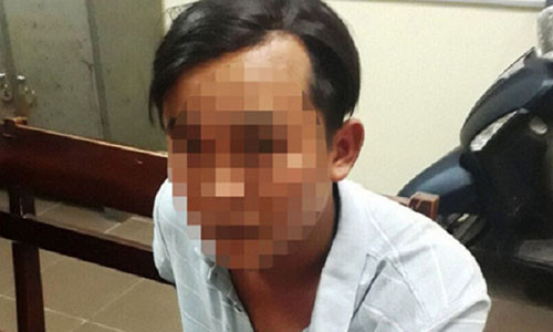 Trần Quốc Toản tại cơ quan công an (Ảnh: báo Thanh niên)