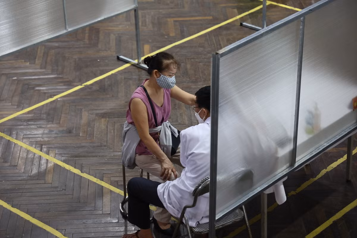 Đây được ghi nhận là địa điểm tiêm đầu tiên của Hà Nội thiết lâp theo mô hình bệnh viện dã chiến.