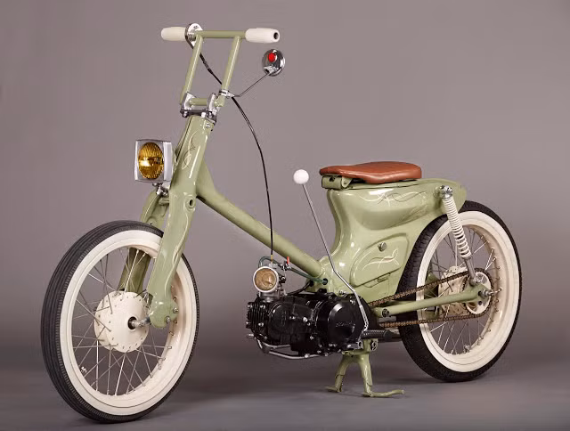 Nguồn cảm hứng của Bob cho phiên bản mới của Passport là những chiếc môtô độ hot rod từ thập niên 60 của Thế kỷ 20. Đầu tiên, bộ khung vành đã được anh sơn lại với màu kem cùng lốp thành trắng đầy vẻ cổ điển.