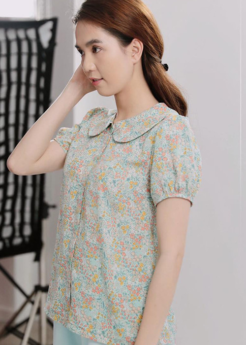 Loạt ảnh Ngọc Trinh hóa gái quê nhanh chóng nhận được sự chú ý giữa ồn ào hôn môi bé trai 8 tuổi.