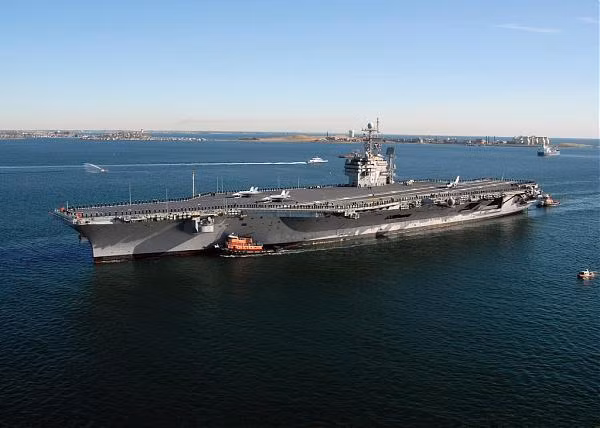 Khẩu hiệu của chiếc USS John F. Kennedy là Date Nolite Rogare (tiếng La-tinh: "Cho đi đừng đòi hỏi"). 