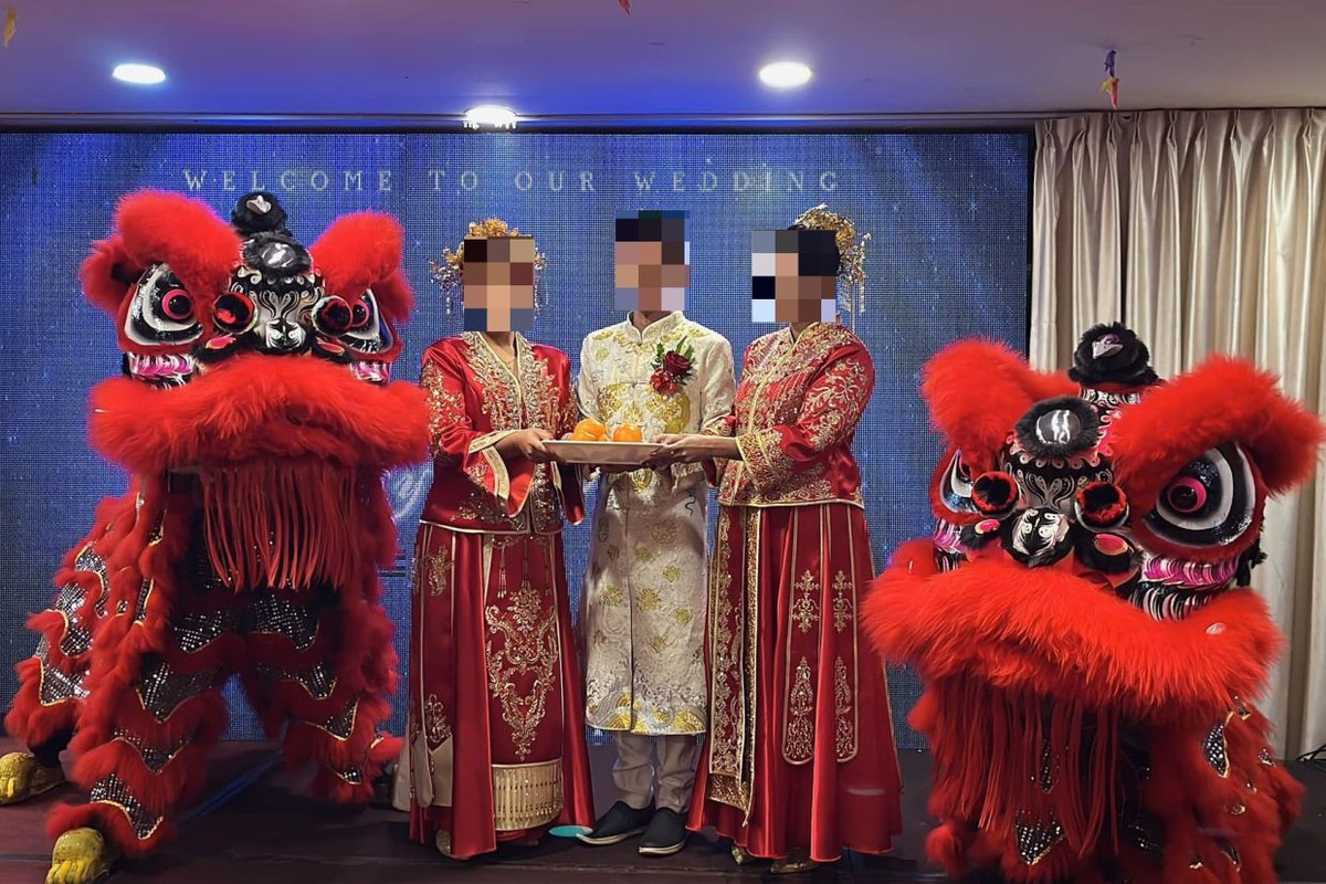 Chang trai Malaysia gay soc khi lam dam cuoi voi 2 co dau