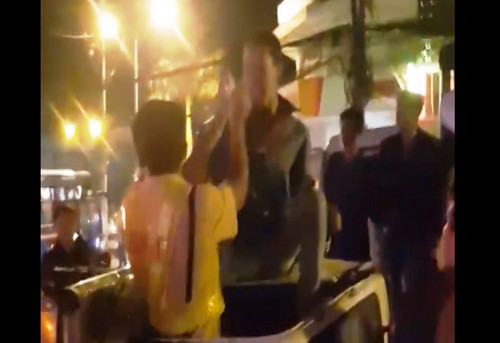 Hình ảnh tài xế Việt đánh Đại úy CSGT Lê Thanh Tài được cắt từ clip.