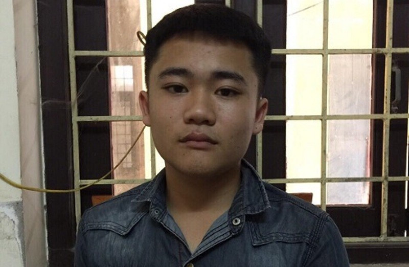 Trần Văn Tú tại cơ quan công an.