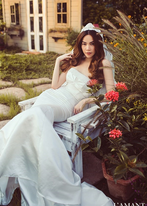 2 năm trước, nữ hoàng giải trí thực hiện bộ ảnh trong chiếc váy cô dâu. Ảnh: Thể thao văn hóa