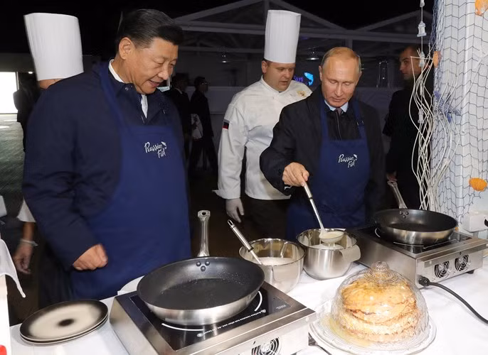 Tong thong Putin mang tap de lam banh kep moi Ong Tap Can Binh