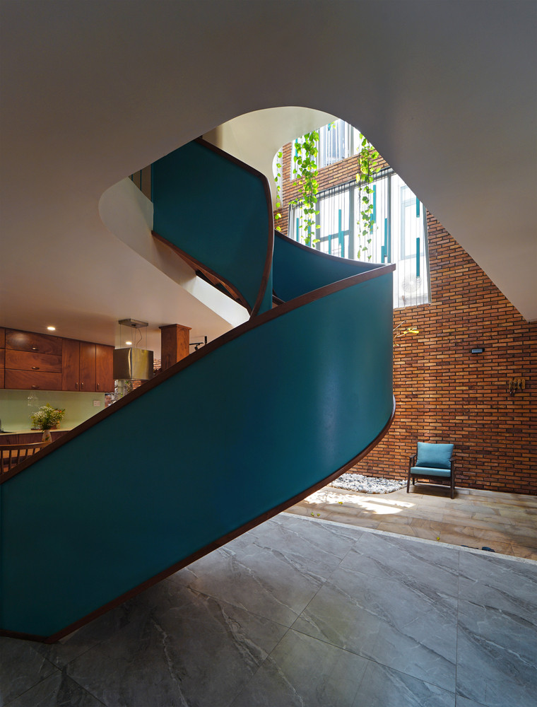 Những bức tường gạch mộc không sơn trát tạo hiệu ứng thẩm mỹ độc đáo. Nguồn ảnh: Nguyễn Cường