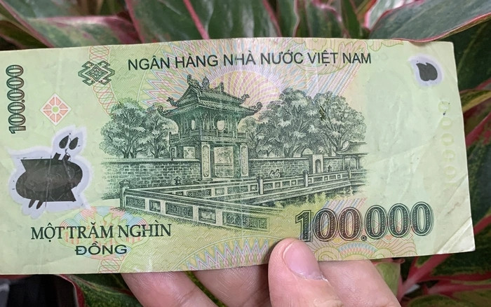 Địa danh in trên tờ 100.000 đồng là Văn miếu Quốc Tử Giám ở Hà Nội. Ảnh: Facebook