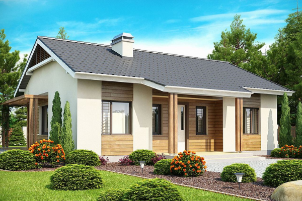 Nhà cấp 4 sang trọng nằm giữa không gian yên bình với thảm cỏ xanh mướt cùng những bụi hoa nhiều màu bắt mắt. Ảnh: Noithatnhaviet