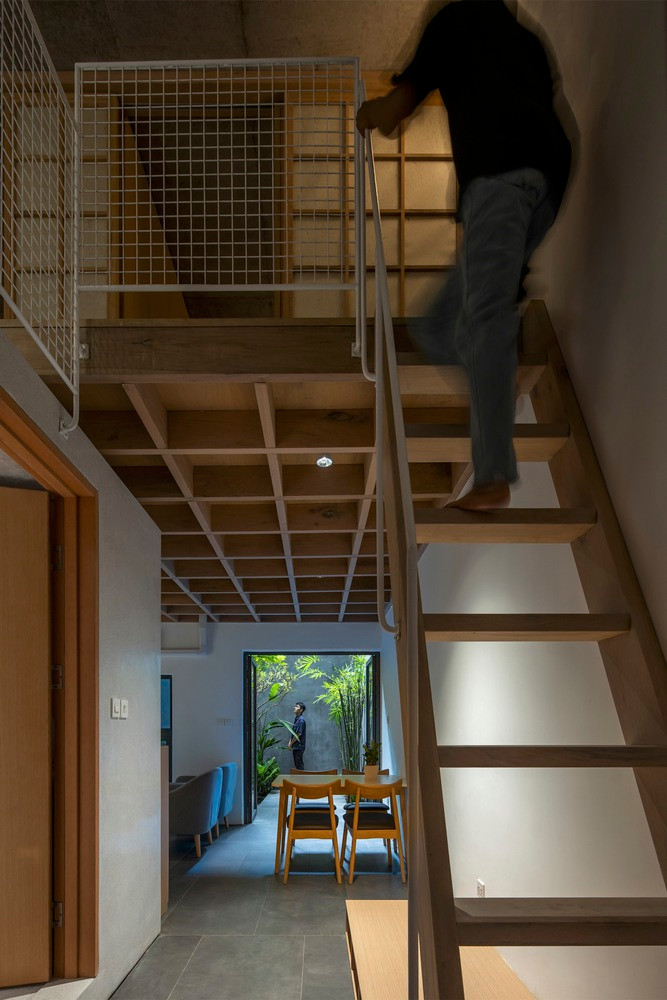 Các công năng cần thiết của một căn hộ được nén thành khối cơ bản 5x5x6(m) bằng bê tông – gỗ tự nhiên – thép.