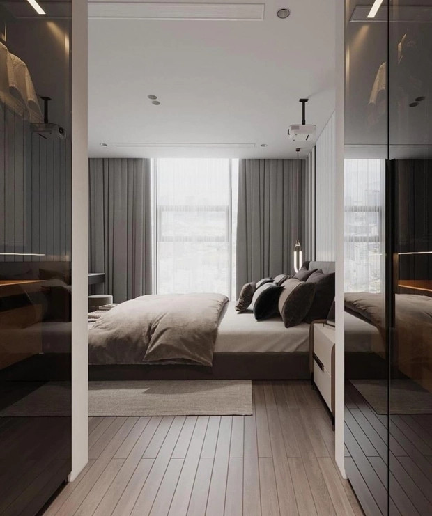 Từ phòng ngủ cũng có thể ngắm cảnh bên ngoài từ tường kính.