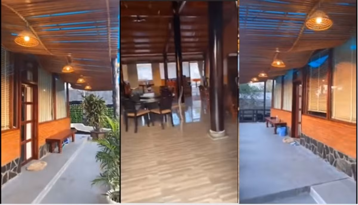 Nội thất trong nhà đều được làm bằng gỗ với rất nhiều bàn ghế trang trí các góc. Ảnh chụp màn hình