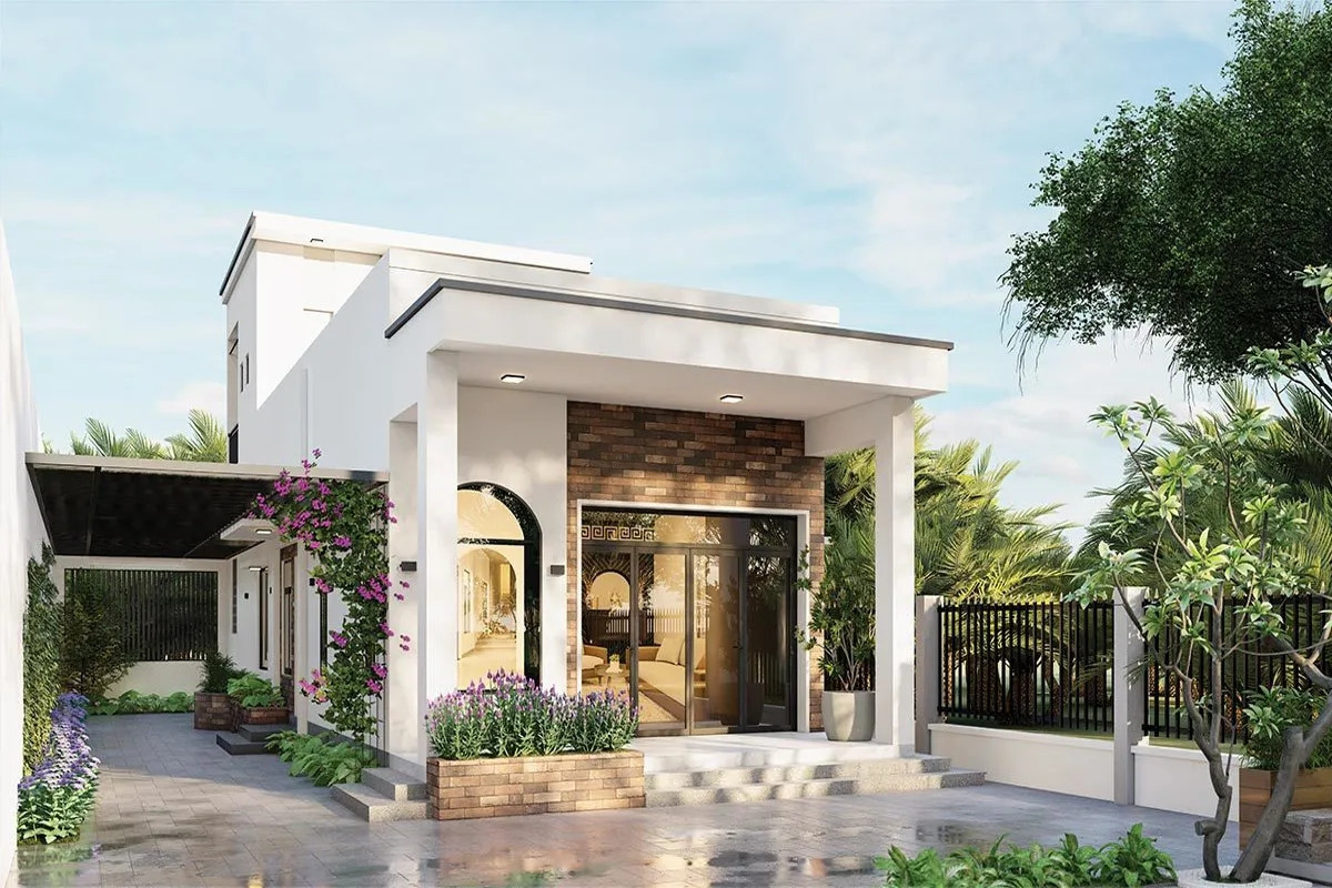 Mẫu nhà cấp 4 mái bằng sử dụng tông màu trắng chủ đạo mang đến cảm giác tươi sáng. Ảnh: Noithattugia