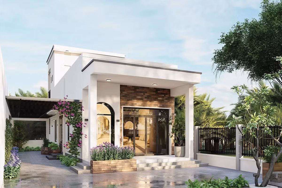 Mẫu nhà cấp 4 mái bằng sử dụng tông màu trắng chủ đạo mang đến cảm giác tươi sáng. Ảnh: Noithattugia