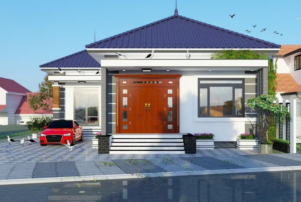 Với sân vườn được quy hoạch, mẫu nhà cấp 4 mái Nhật này có thể tận dụng được nhiều công năng như chỗ để xe, sân chơi, góc đọc sách... Ảnh: Xaynhadeponline