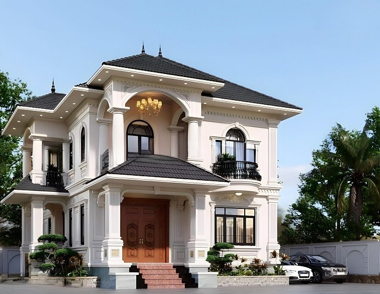 Nhà 2 tầng mái Nhật mang phong cách kiến trúc tân cổ điển không bị lỗi thời với điểm nhấn là các họa tiết cầu kỳ trên trường nhà, cửa ra vào hay lan can. Ảnh: Xaydungnhauytin