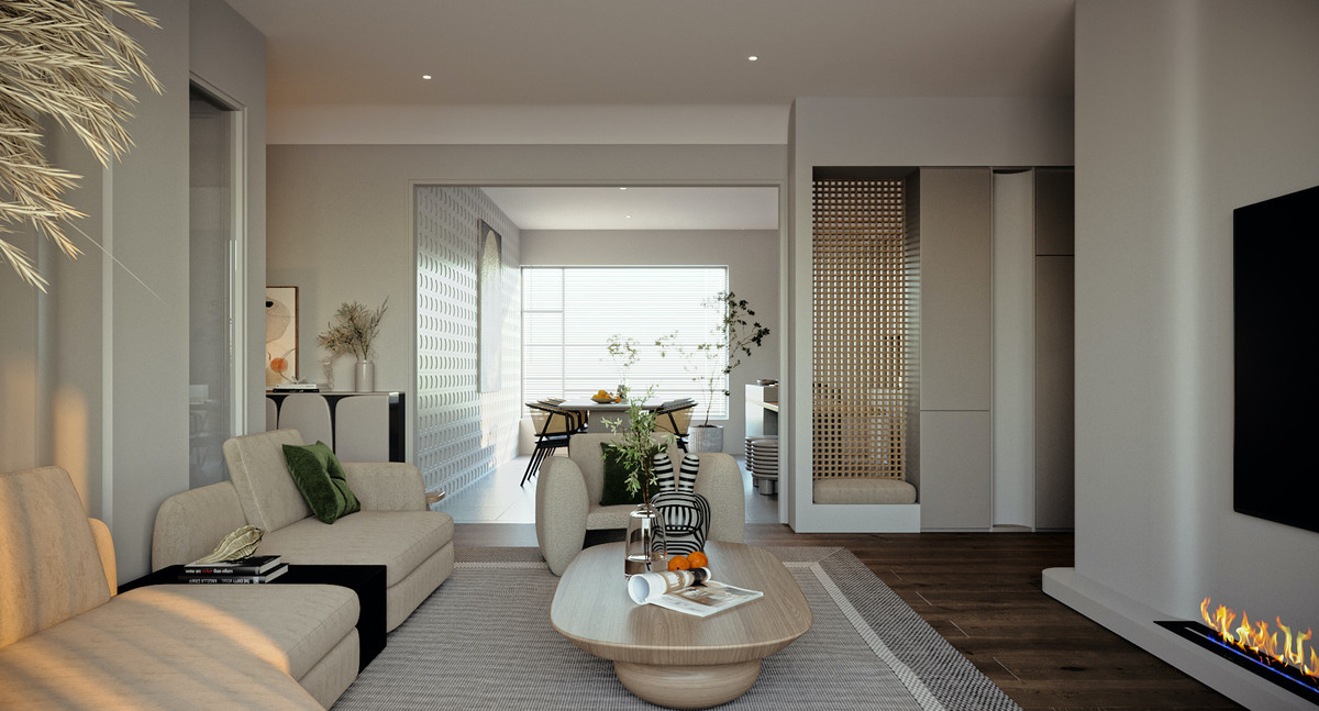 Phòng khách thiết kế liên thông với phòng ăn và nhà bếp, có một vách ngăn nhỏ để che chắn khu bếp. Ảnh: FBNV