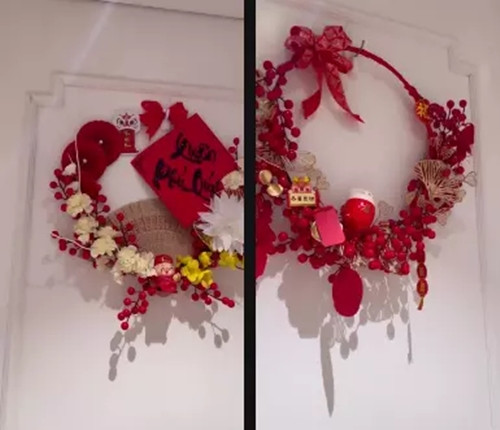 Lệ Quyên chọn các món đồ màu đỏ cho căn nhà trong dịp đón năm mới như quạt giấy đỏ, vòng hoa đỏ treo ở các phòng.