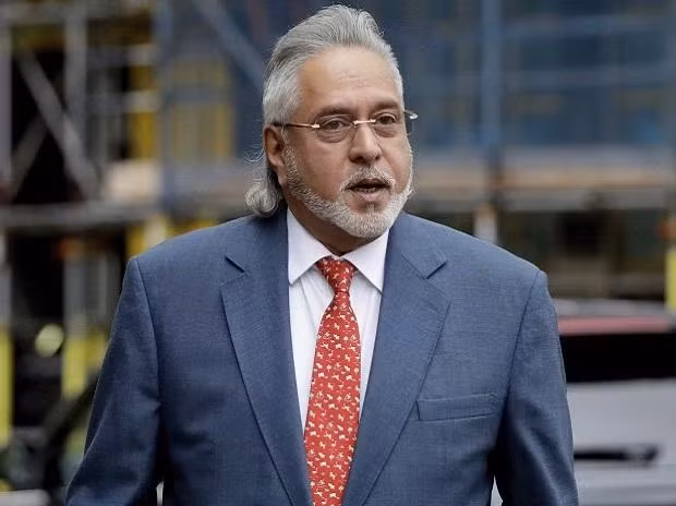 Vijay Mallya là con trai của Vittal Mallya, một doanh nhân có tiếng đến từ Ấn Độ. Tháng 10/1983, tỷ phú Vittal Mallya đột ngột qua đời sau khi lên cơn đau tim nghiêm trọng. Thời điểm đó, Vijay phải tiếp quản đế chế kinh doanh hùng hậu mà cha đã dày công gây dựng. Ảnh: Business Standard