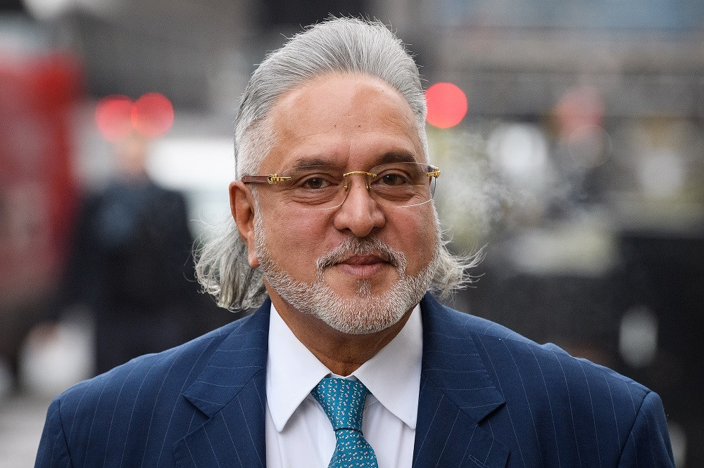 Khi còn trên đỉnh cao của sự thành công và hào nhoáng, Vijay Mallya này là chủ tập đoàn hàng không Kingfisher, ông còn lập cả một thương hiệu bia đồng thời là trùm đội đua F1. Ảnh: SportsPro Media