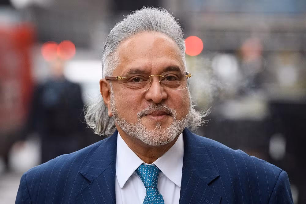 Khi còn trên đỉnh cao của sự thành công và hào nhoáng, Vijay Mallya này là chủ tập đoàn hàng không Kingfisher, ông còn lập cả một thương hiệu bia đồng thời là trùm đội đua F1. Ảnh: SportsPro Media