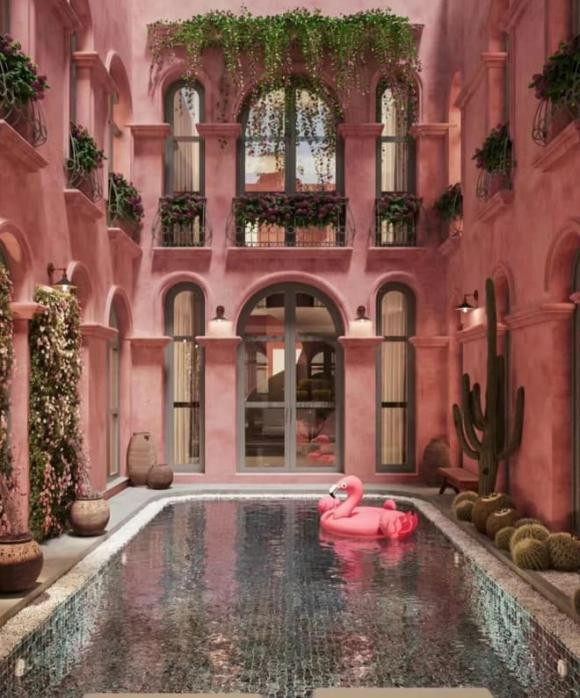 Khu vực này được ẩn vào bên trong không gian nhà đảm bảo sự riêng tư cho gia chủ, phần trần mở đón ánh nắng và ánh sáng tự nhiên. Hai bên là cây xanh mang đến cảm giác tươi mát.