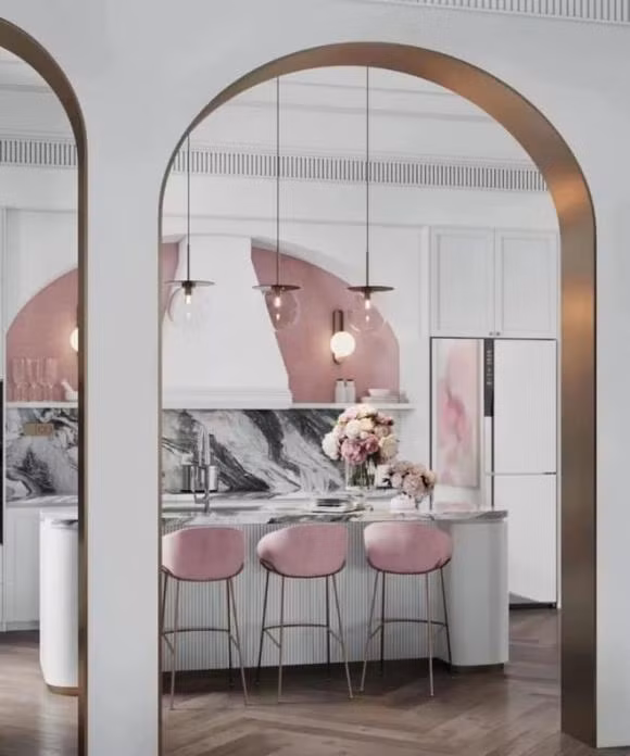 Đảo bếp và khu vực bàn ăn của căn villa đều liên kết với nhau trong một không gian rộng.