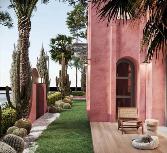 Ngoài phần nhà chính, xung quanh biệt thự được thiết kế riêng những khoảng vườn để trồng cây xanh.