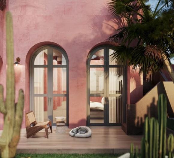 Cửa nhà và cửa sổ thiết kế hình mái vòm mềm mại vừa tạo sự kết nối với thiên nhiên ngoài khu vườn xanh ấn tượng, vừa thể hiện được phong cách và gu thẩm mỹ của gia chủ.