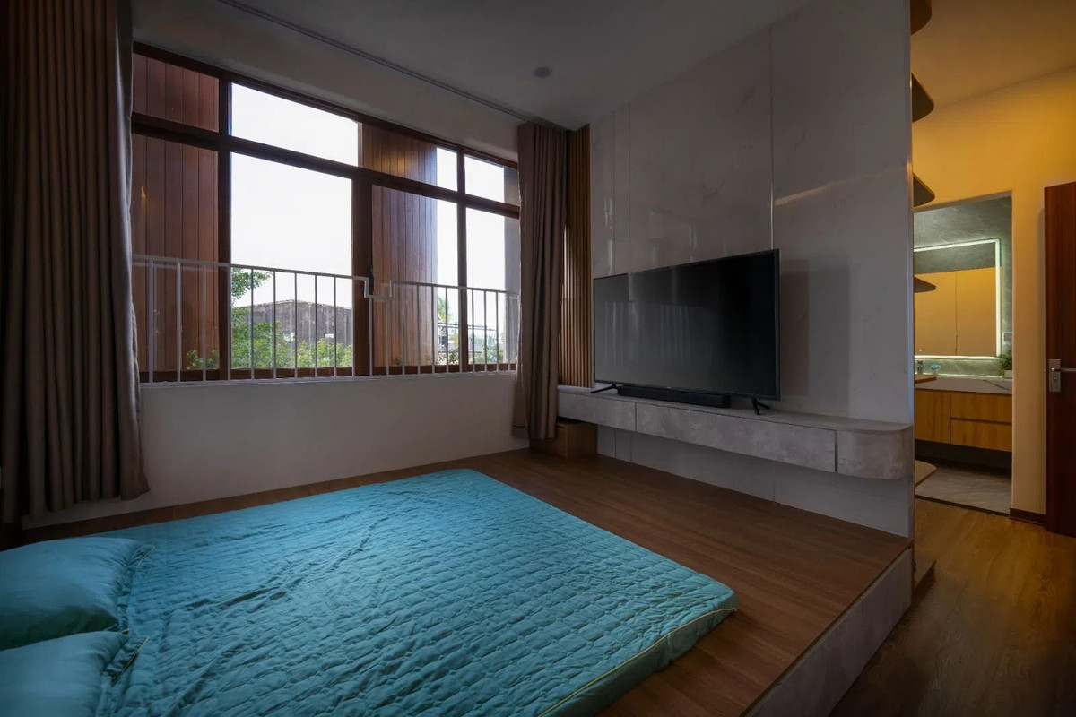 Phòng ngủ thiết kế đơn giản nhưng vẫn tiện nghi. Ảnh: GreenConcept