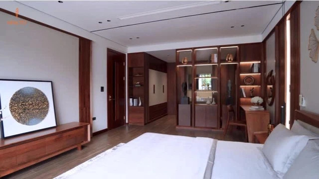 Nếu như phòng khách thiết kế không gian mở, thoáng thì 4 phòng ngủ lại tạo ra sự ấm cúng, giản dị với tone màu gỗ.