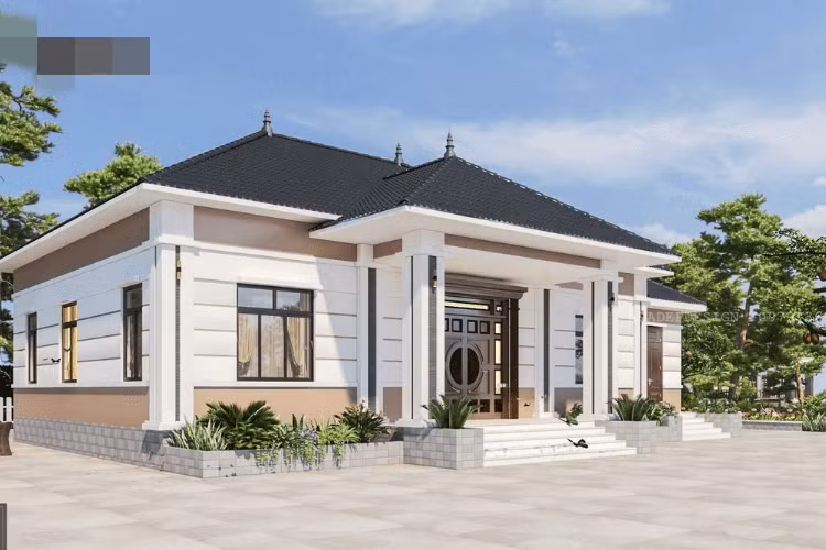 Mẫu nhà mái Nhật 1 tầng hiện đại có hệ thống bồn hoa trước nhà. Ảnh: Tostem