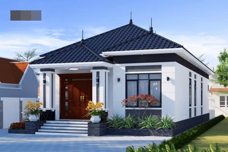 Nhà cấp 4 mái Nhật mang phong cách hiện đại sử dụng cửa nhôm kính giúp tiết kiệm chi phí. Ảnh: Tostem