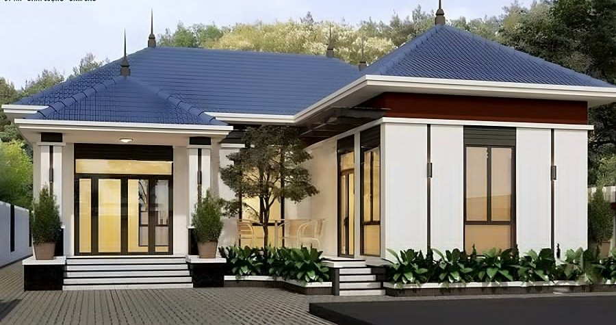 Nhà mái Nhật chữ L phù hợp với những khu vực có diện tích đất rộng rãi, thông thoáng. Gia chủ sử dụng các loại vật liệu như đá hoa cương, gạch ốp, kết hợp cùng hệ thống cửa kính lớn hiện đại. Ảnh: Xaydungnhauytin