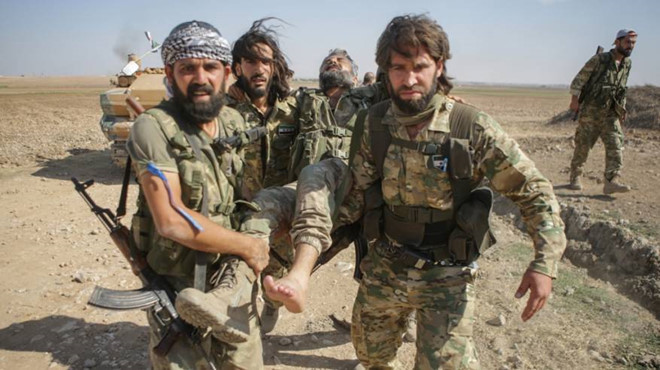 TNK phao kich trung nha giam, hon 700 tu binh IS dao tau