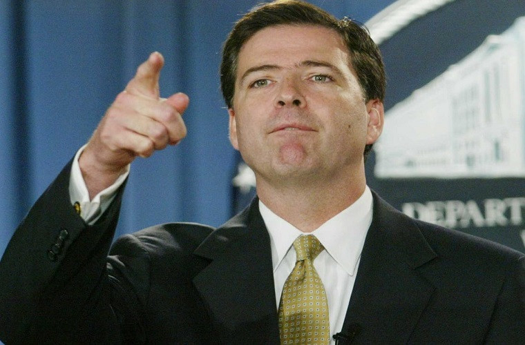 Hồi tháng 5/2017, Tổng thống Trump bất ngờ sa thải Giám đốc Cục Điều tra Liên bang James Comey, theo khuyến nghị của Bộ trưởng Tư pháp Mỹ. Ảnh: BI.