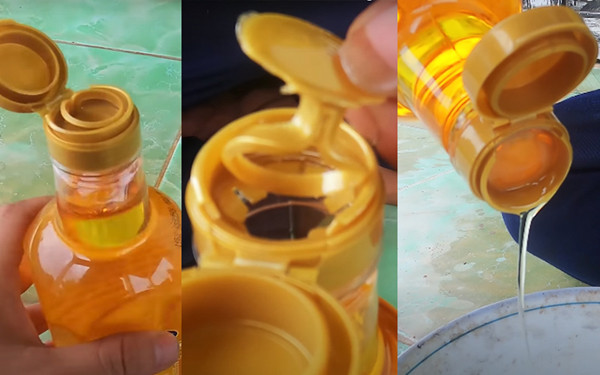 Để thuận tiện, bạn hãy úp ngược chiếc nắp mỏng này xuống, phần quai giật quay vào lòng chai. Chiếc van tự chế sẽ giúp bạn lấy dầu ăn không lo đổ quá tay. Ngay cả khi bạn dốc ngược chai thì lượng dầu ăn vẫn chảy ra nhẹ nhàng.