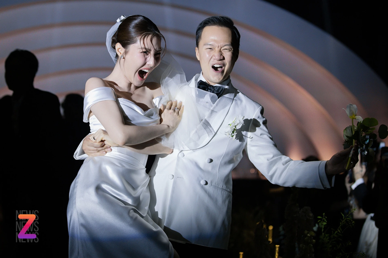 Vợ chồng Diễm My hát nhảy ca khúc I will follow him. Ảnh: Znews.