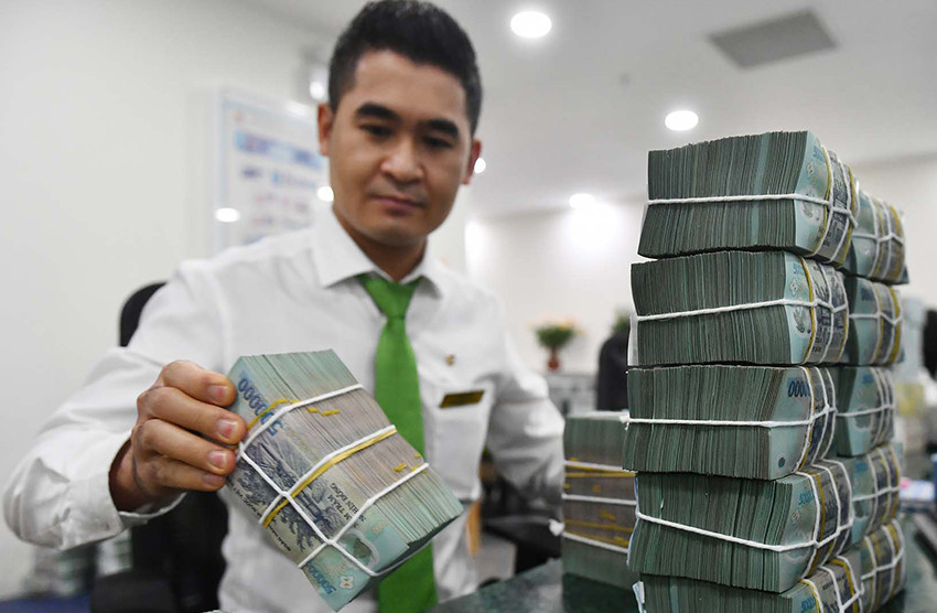 Giam lai suat, co cau no, ha thue: Cu hich du manh cho kinh te?