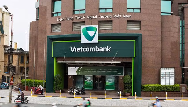 Ngân hàng Vietcombank vừa công bố lợi nhuận trước thuế đạt 11.018 tỷ, tăng 32,9% so với năm 2016, thực hiện 116% kế hoạch 2017. Ảnh: laisuatnganhang.vn.