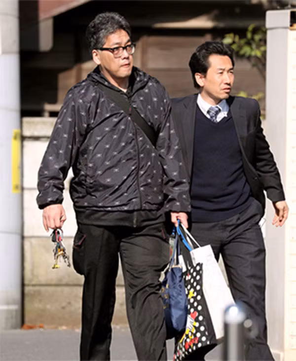 Nghi phạm bị cảnh sát Nhật bắt giữ. Ảnh: NHK.