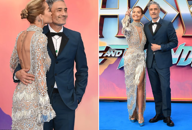 Ca sĩ Rita Ora đến chúc mừng tác phẩm mới của chồng sắp cưới - Taika Waititi. Cả hai không ngại trao nhau nụ hôn ngọt ngào trước ống kính của nhiếp ảnh gia. Đôi uyên ương đang lên kế hoạch để tổ chức lễ cưới trong thời gian tới.