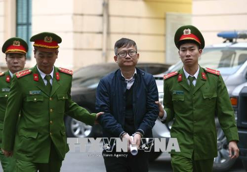 Bị cáo Đinh Mạnh Thắng tại Tòa sáng nay. Nguồn ảnh: TTXVN