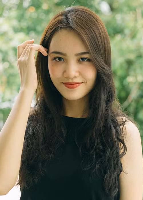 Hoa khôi 9x thích chơi các môn thể thao như cầu lông, bóng rổ, bơi lội. Ảnh: FBNV