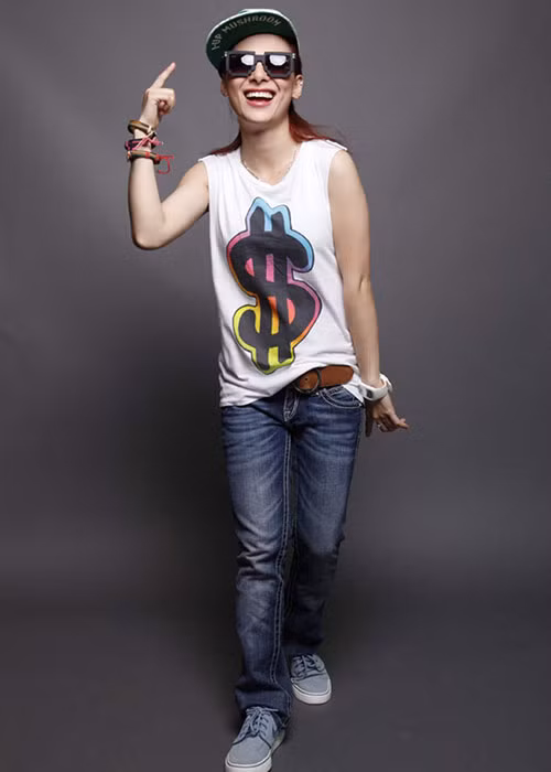 Trish Lương cũng được nhiều người biết đến nhờ gương mặt có nhiều nét giống ca sĩ Phi Nhung. Ảnh: Zing