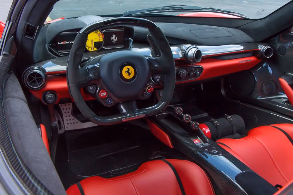 Ở bên trong nội thất, LaFerrari sở hữu thiết kế tối giản và mang đậm phong cách xe đua. Để giảm trọng lượng, bảng táp-lô và bệ trung tâm của chiếc xe đã được làm hoàn toàn từ sợi carbon giống như chassis, đồng thời có số nút bấm được tối giản ít nhất có thể. Bảng đồng hồ của xe là một màn hình hiển thị màu đa thông tin, trong khi nhiều nút công tắc đã được dời lên vô-lăng kiểu xe đua.